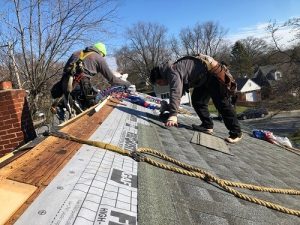 joyland roofing roofers installing an asphalt shingle roof