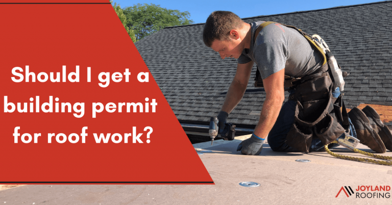 joyland roofing roofer installing ISO board to a flat roof with the caption "Should I get a building permit for roof work?"