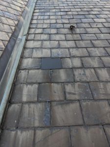 missing piece of slate was replaced on a church by joyland roofing