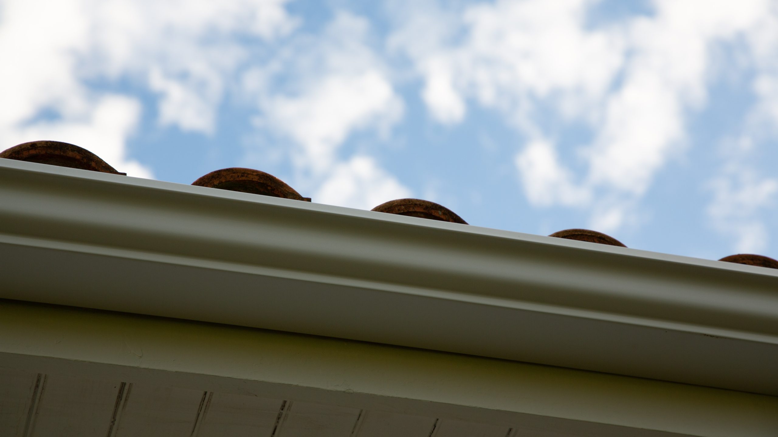 White frame gutter system installed in home  in Mechanicsburg, PA